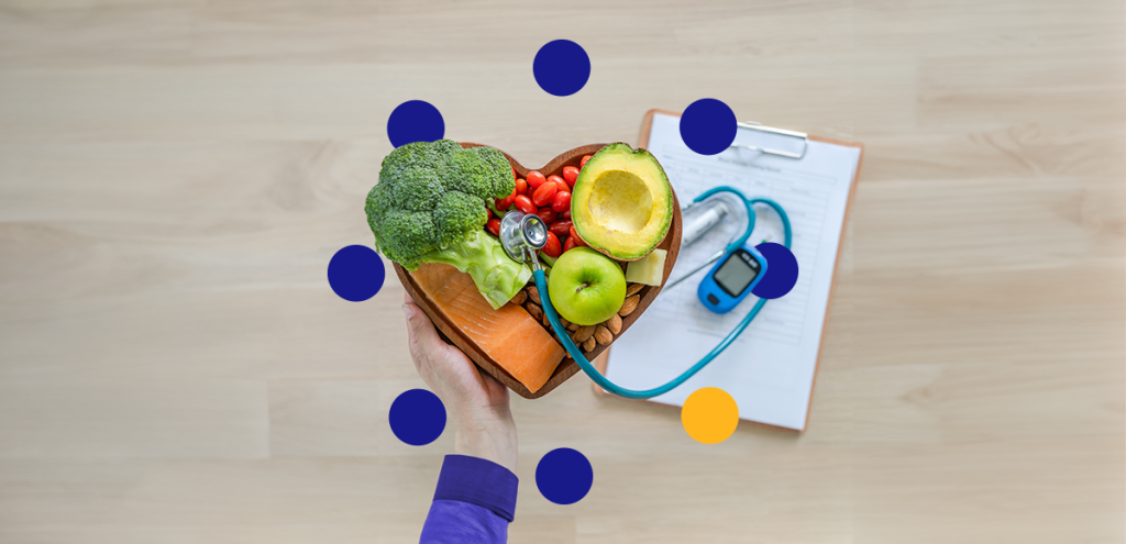 Frutas, legumes, prancheta, estetoscópio e medidor de glicose, simbolizando o dia mundial do diabetes