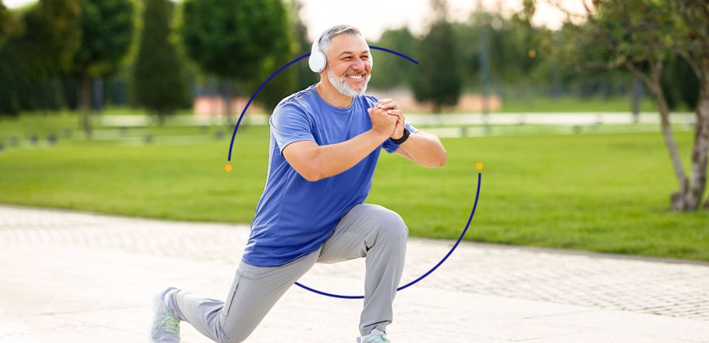 Homem ao ar livre praticando exercícios físicos, simbolizando o dia mundial da atividade física.
