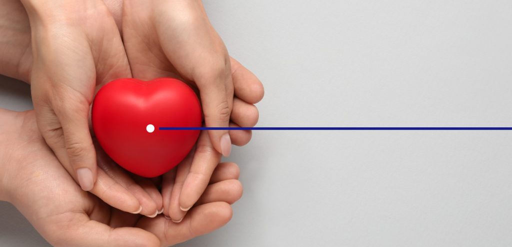 imagem de duas mãos segurando um coração, simbolizando o dia mundial da saúde.
