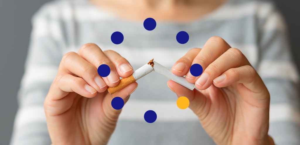 Imagem de mãos partindo um cigarro ao meio, simbolizando Dia nacional de combate ao fumo